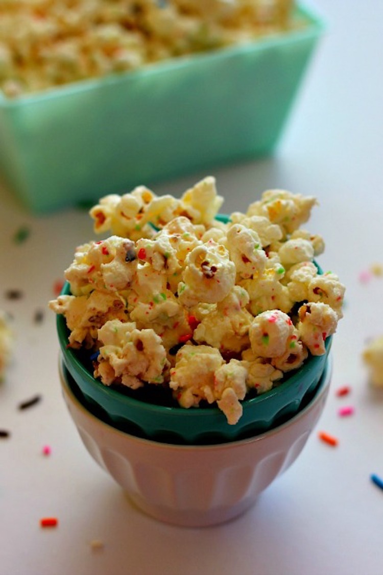 Filled with creamy white chocolate, yellow cake mix, and colorful sprinkles, you'll find a new reason to celebrate with this Cake Batter Popcorn. | Ideahacks.com