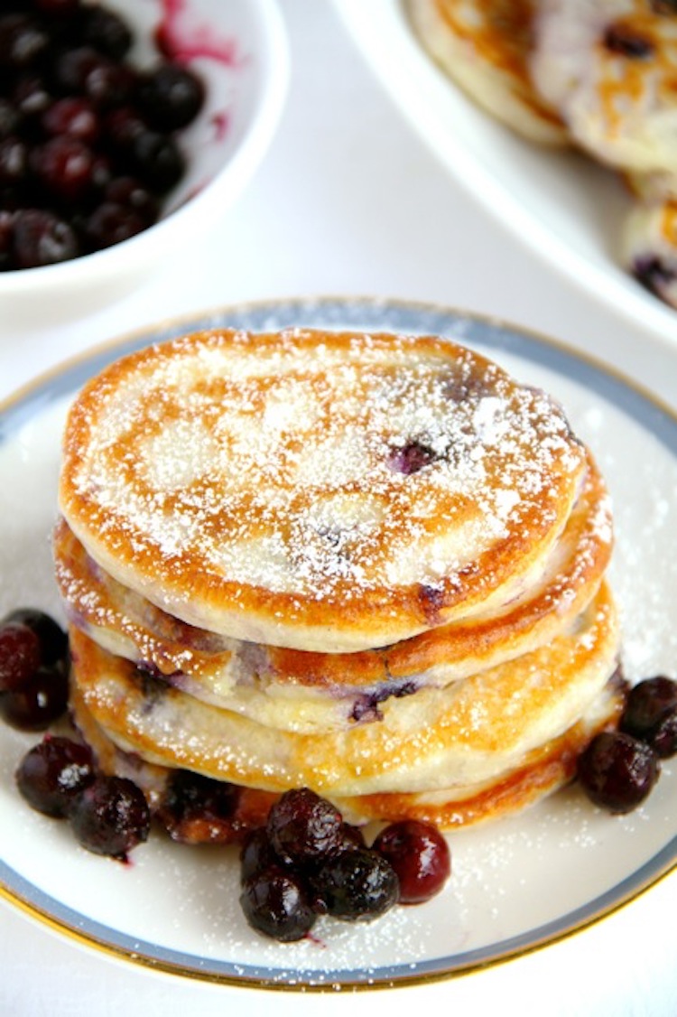 A fabulously delicious lemon blueberry buttermilk pancake recipe that is so soft and fluffy, they melt right in your mouth. | Ideahacks.com