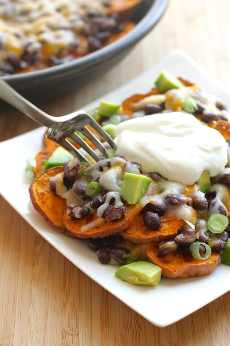 Sweet Potato Nachos - Load up some crispy sweet potatoes with your favorite fixin's to make these nachos out of this world! | Ideahacks.com