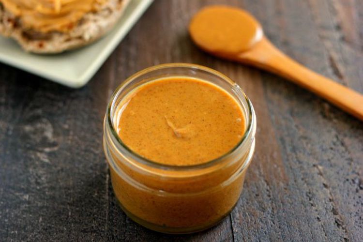 This Maple Cinnamon Peanut Butter is jam-packed with honey roasted peanuts, sweet maple syrup, and a touch of cinnamon! Ideahacks.com
