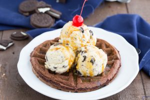 Salted Caramel Cookies & Cream Waffle Sundaes - warm chocolate cakey waffle bottom with plenty of melty cookies and cream ice cream all topped with salted caramel sauce. | Ideahacks.com