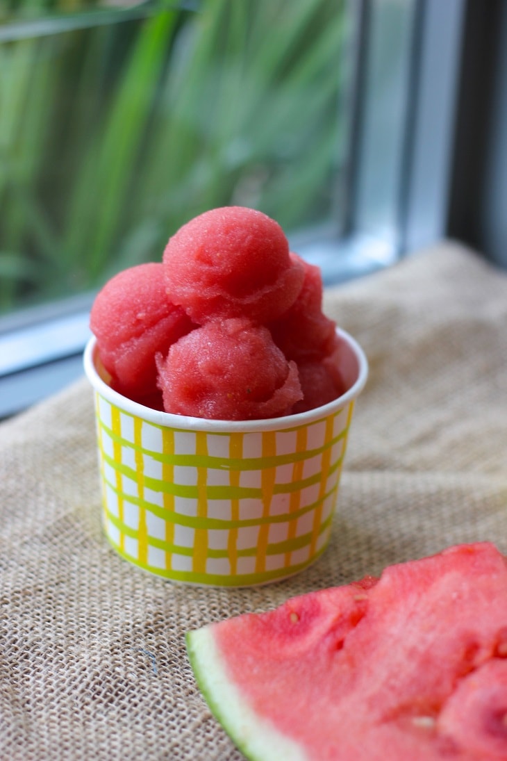 a bowl of watermelon raspberry sorbet ready to be served