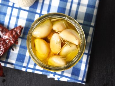 Garlic Confit - This recipe can be used to go on pizza, pasta, and mashed potatoes. It makes a great olive oil as well. | Ideahacks.com