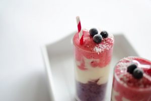 Red White and Blue Smoothie - 4th of July is just around the corner so celebrate with this packed strawberries, blueberries, banana, and almonds smoothie. | Ideahacks.com