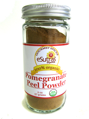 Powder of pomegranate in a glass jar