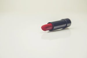 Dark Red Lipstick on white background