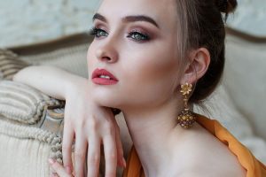 Portrait of beautiful woman model with fresh makeup