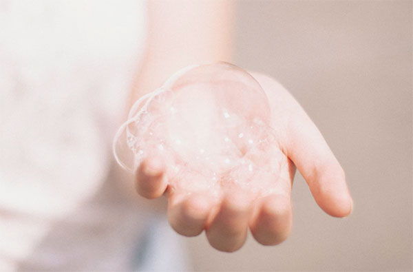Person holding a bubbles