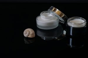 two face cream with an open lid
